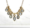 June & Simple Mother of Pearl 7 Stones Necklace - seven iridescent charms on gold filled chain
