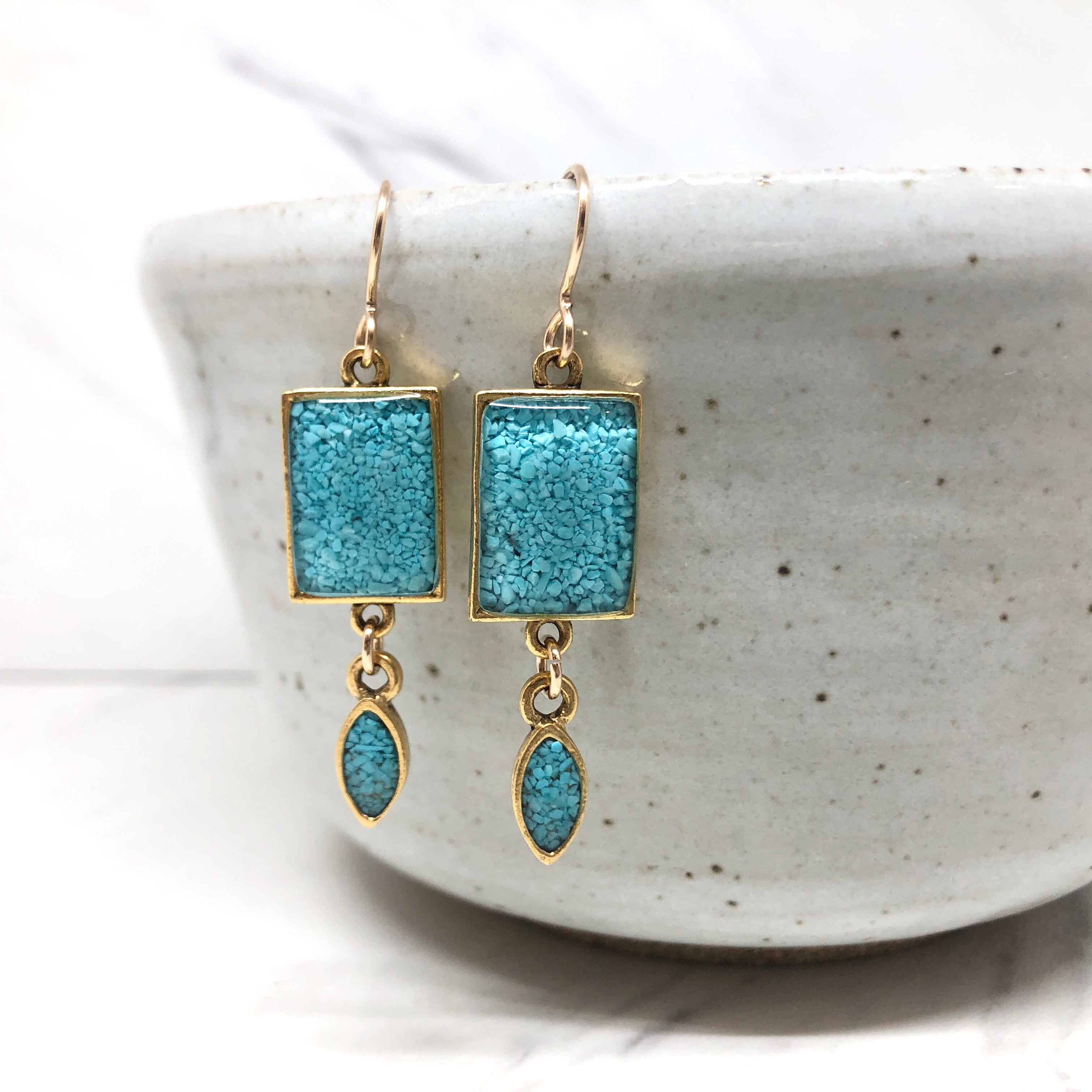 June & Simple Turquoise Geometric Drop Earrings — flat lay on white background
