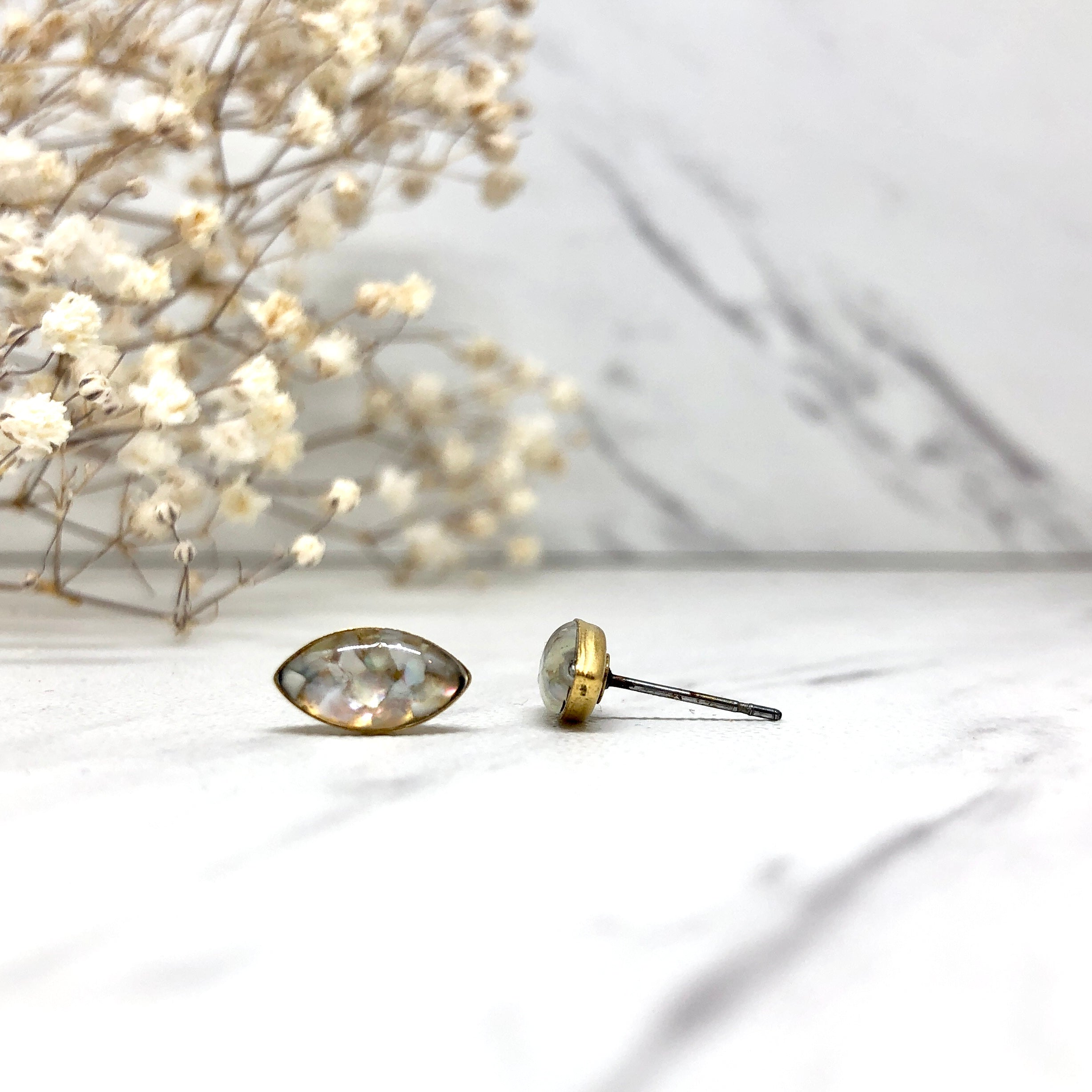 June & Simple Marquise Mother of Pearl Studs — pair flat lay on white background