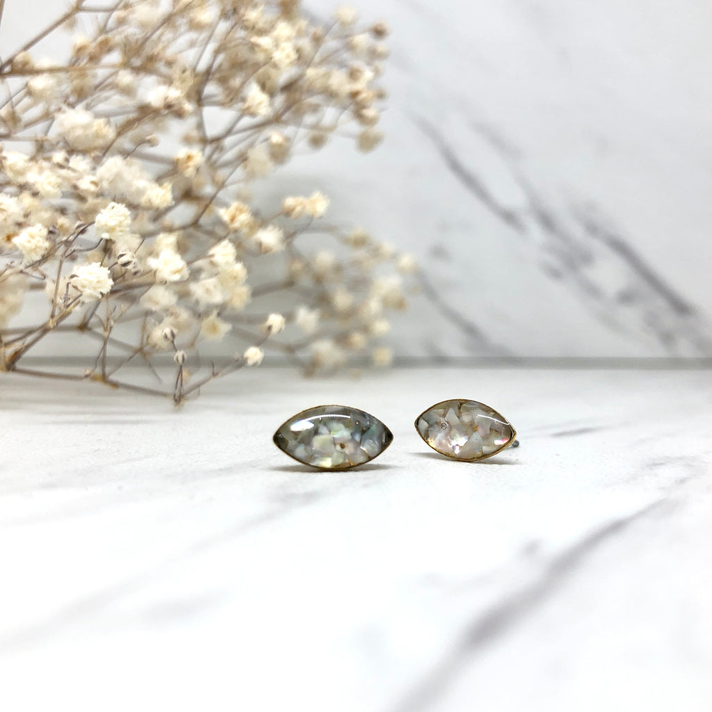 June & Simple Marquise Mother of Pearl Studs — styled on a model