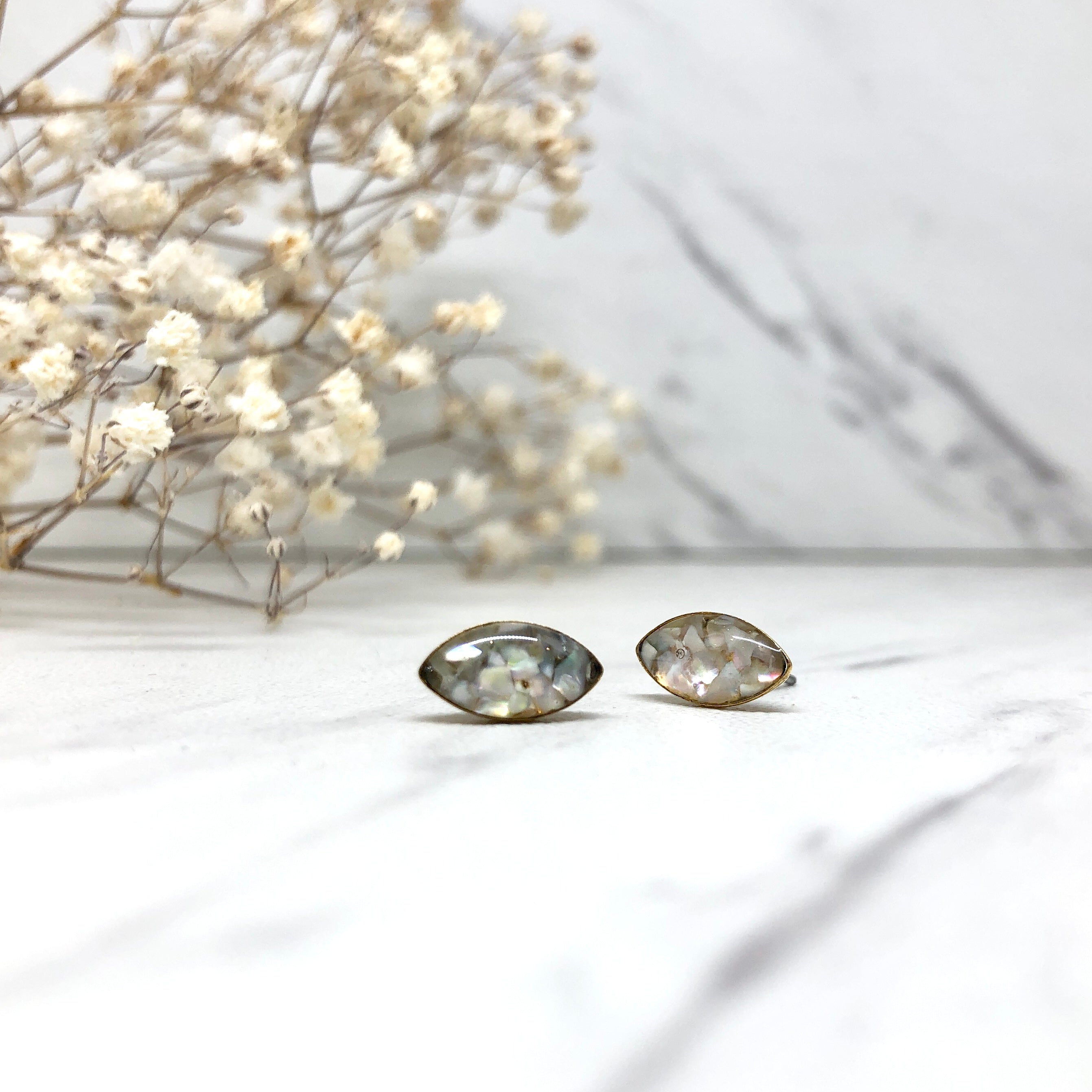 June & Simple Marquise Mother of Pearl Studs — styled on a model