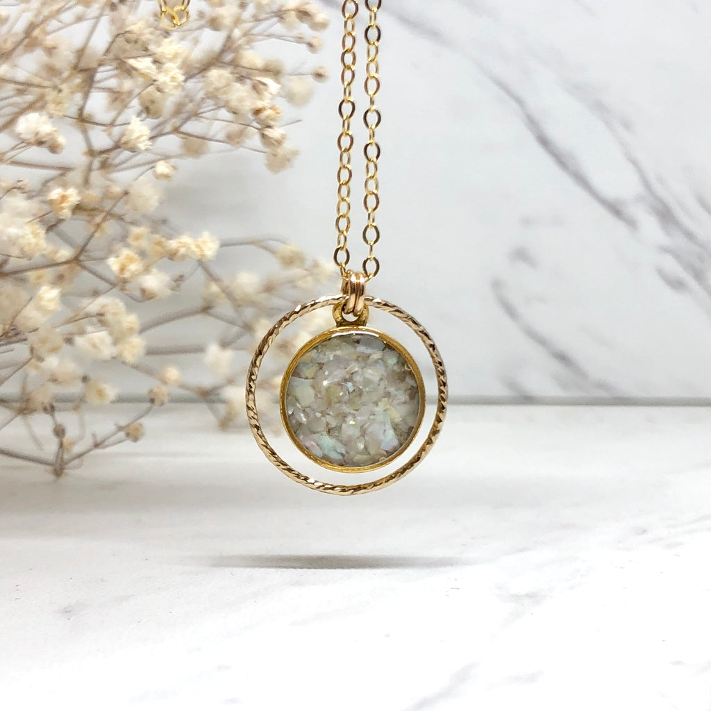 June & Simple Circle of Love Mother of Pearl Necklace — close-up of iridescent pendant
