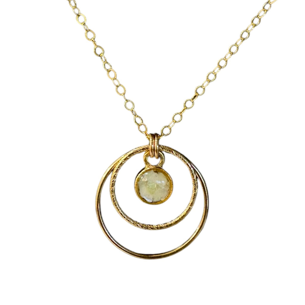 June & Simple Double Hoops Mother of Pearl Earrings — styled on a model