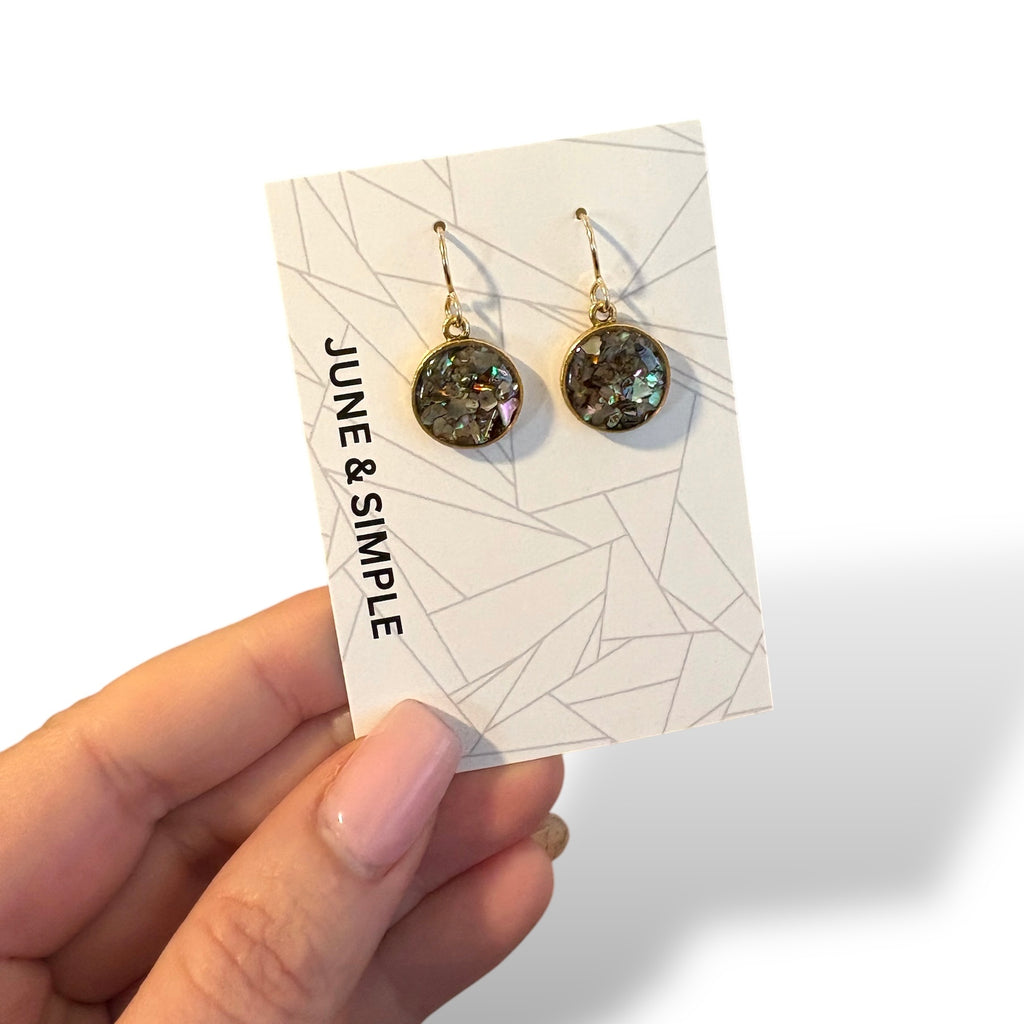 June & Simple Abalone Circle Earrings M Size — styled on a model
