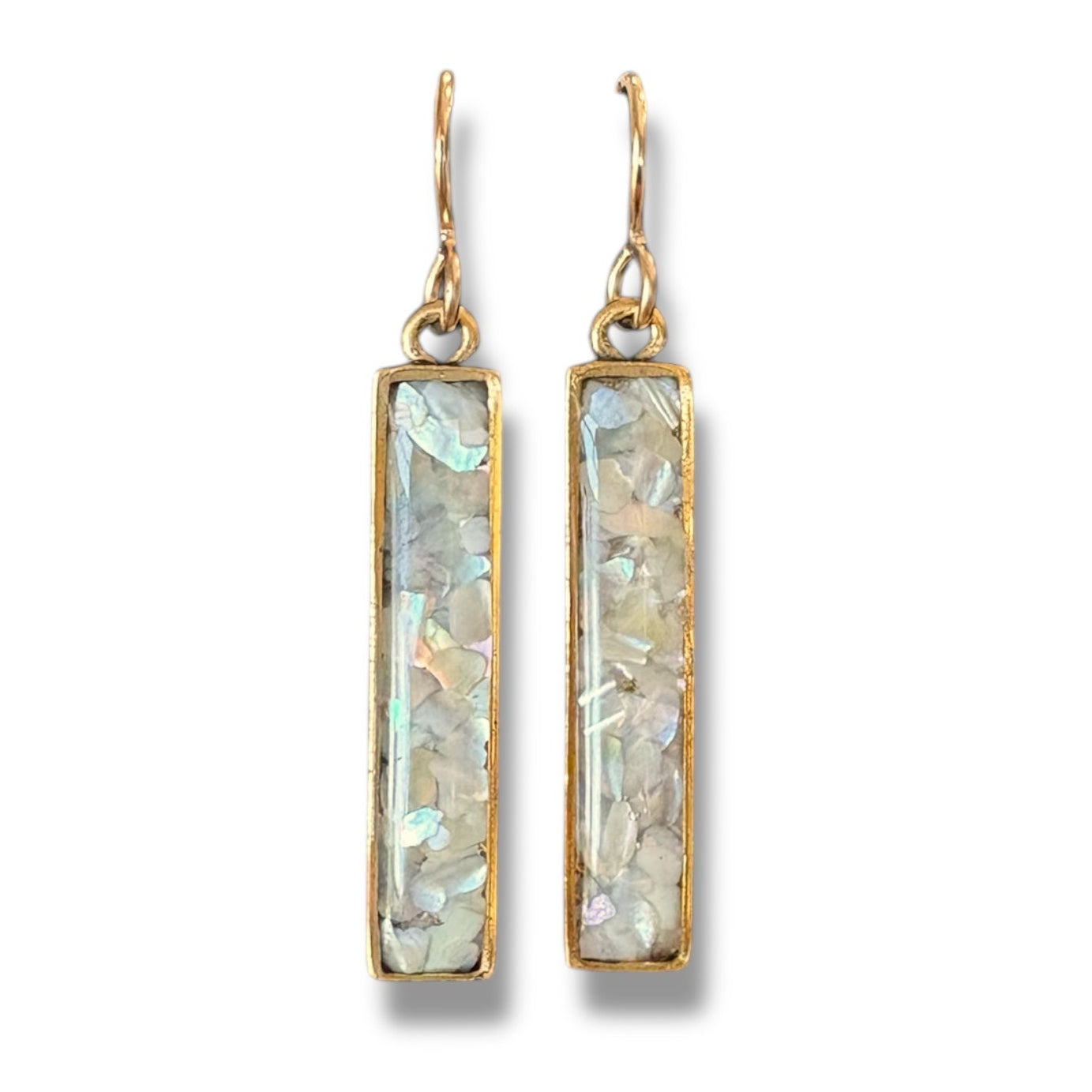 Pair of gold earrings with rectangular gemstones on a white background