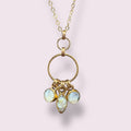 Mother of Pearl Ring Charm Necklace — three faceted mother of pearl charms on a gold-filled ring by June & Simple