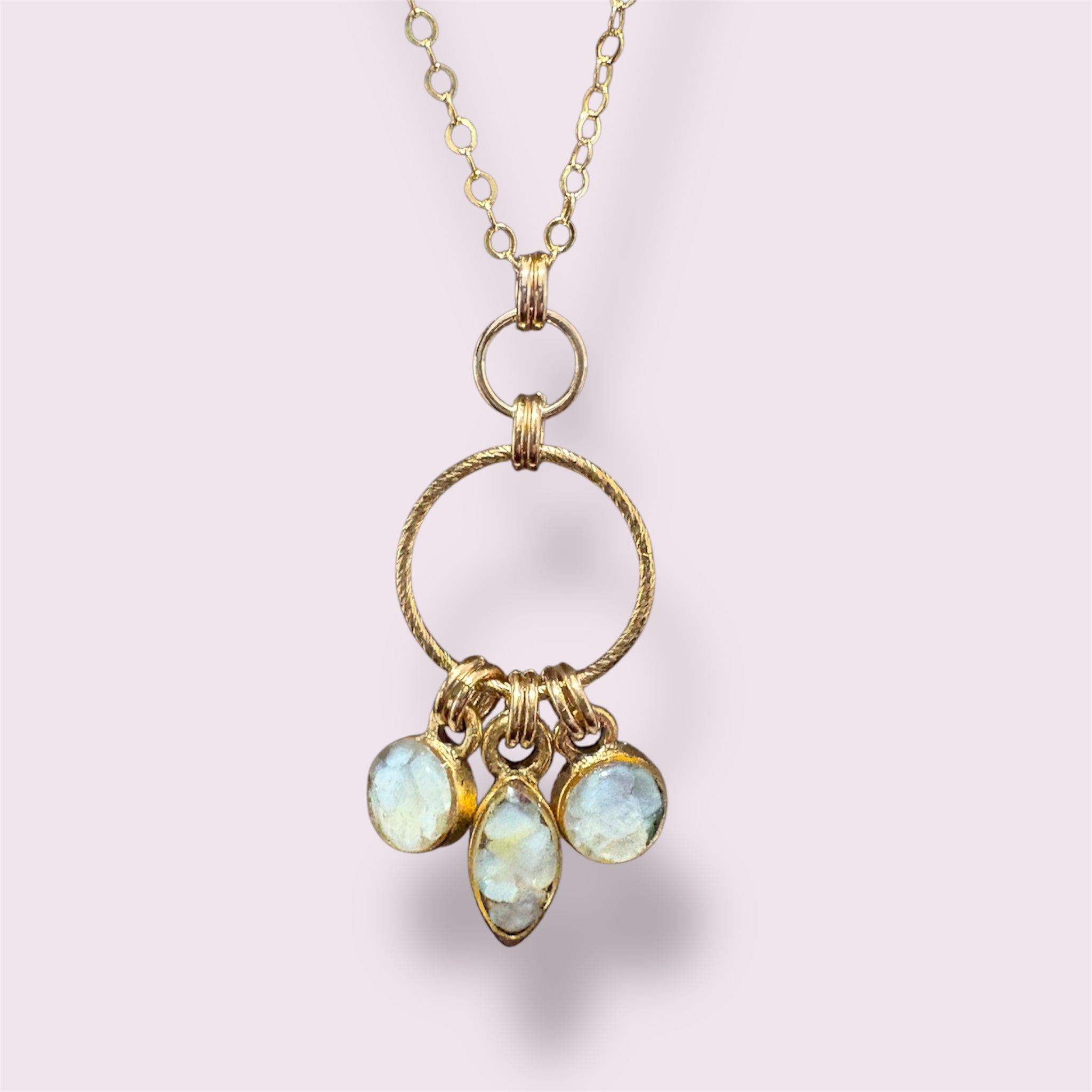 Mother of Pearl Ring Charm Necklace — three faceted mother of pearl charms on a gold-filled ring by June & Simple