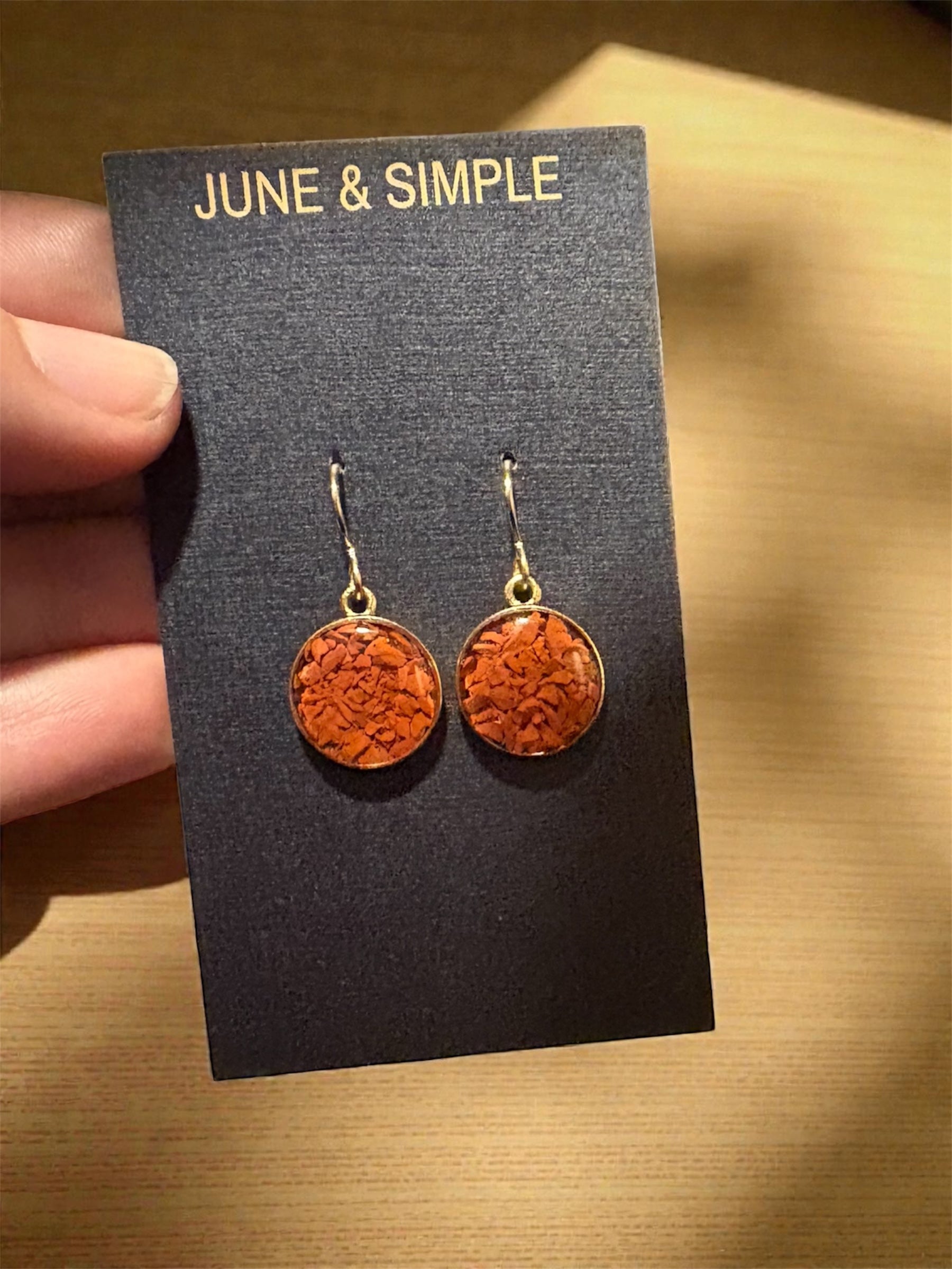 June & Simple Red Jasper Circle Drop Earrings — close-up of warm orange-red jasper circle pendant