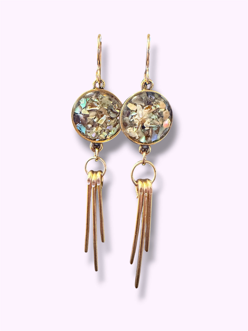 Abalone Ray Earrings - close-up of crushed abalone shell in a gold-filled ray setting