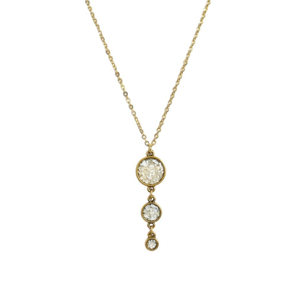 June And Simple gold-filled necklace with three crushed mother of pearl pendants in graduating sizes. Iridescent shine.