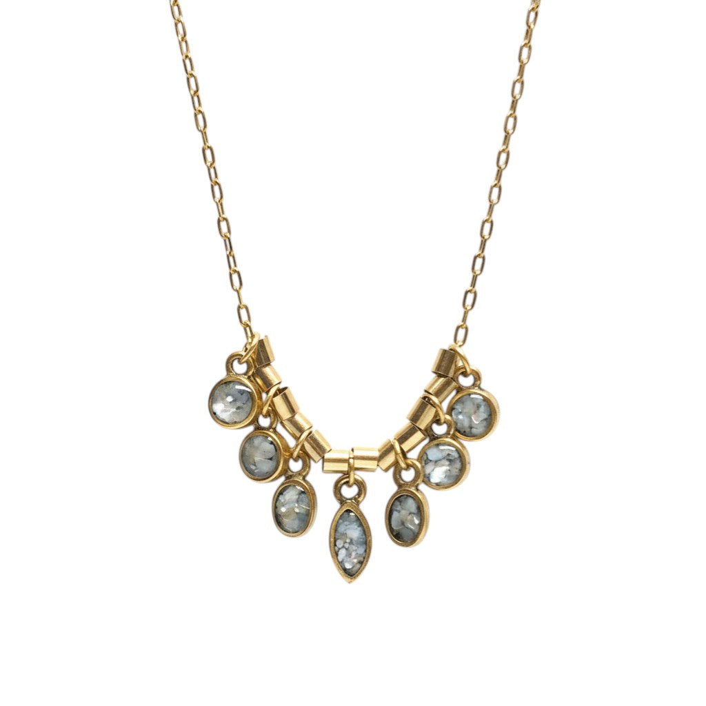 June And Simple gold plated necklace with 7 mini mother of pearl charms in round and oval shapes.
