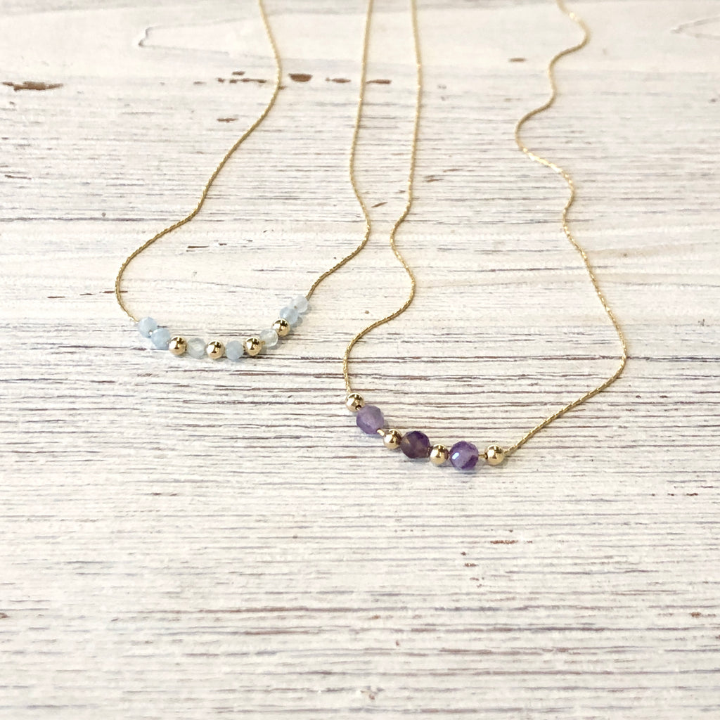 June & Simple Gems and Gold Delicate Necklace — styled on a model
