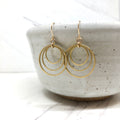 June & Simple Olive Earrings — handmade minimalist gold drop earrings with olive-shaped detail