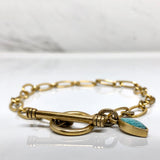 Bracelet and a charm