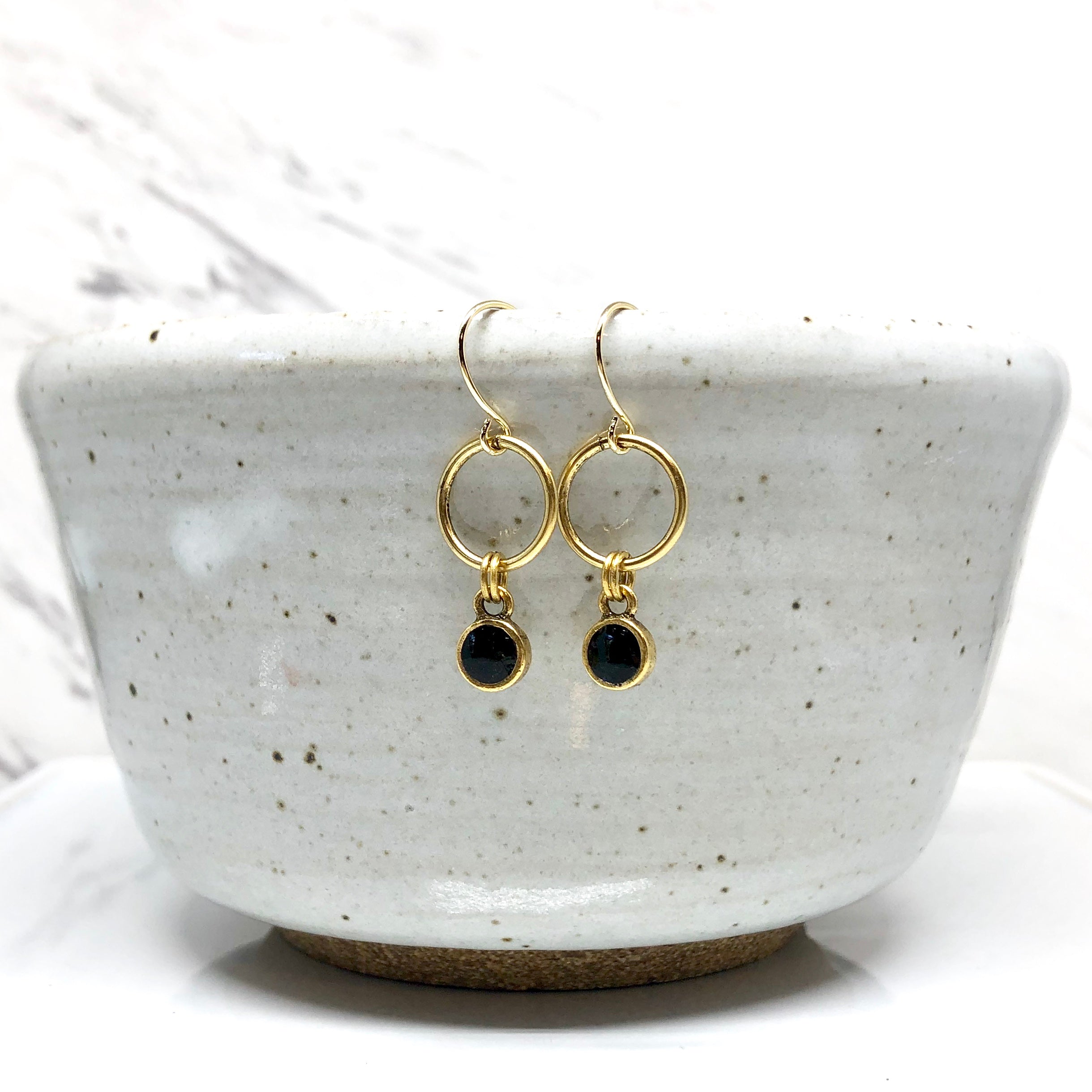June & Simple Mini Circle Black Earrings - styled on a model